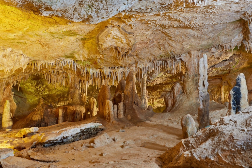 Stalactites and stalagmites inside the Can Marçà Cave in Puerto de San Miguel, Ibiza